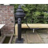 A GOOD QUALITY CAST IRON GARDEN ORNAMENT IN THE FORM OF A WATER PUMP, 5ft tall
