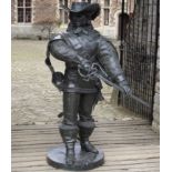 A LARGE DECORATIVE FIGURE OF A MUSKETEER