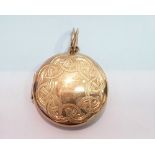A 9CT YELLOW GOLD LOCKET, with celtic design