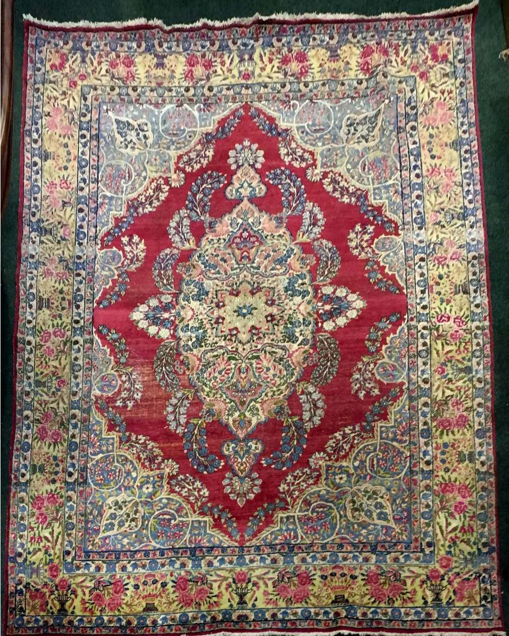 A VERY FINE VINTAGE KERMAN FLOOR RUG, with central medallion motif, surrounded by floral and foliage