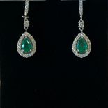 A PAIR OF 18CT WHITE GOLD EMERALD & DIAMOND DROP EARRINGS