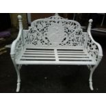 A WHITE CAST IRON GARDEN SEAT, with picture panel back