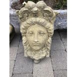 A STONE HANGING PLANTER, 49cm high approx
