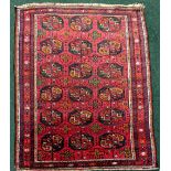 A VERY FINE BALOUCH FLOOR RUG with multiple borders, the central field decorated with multiple