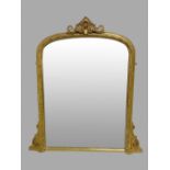 A VERY GOOD QUALITY 19TH CENTURY GILT OVER MANTLE MIRROR, fully restored, having an arched top