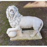 A QUALITY PAIR OF RE-CONSTITUTED STONE GARDEN ORNAMENTS IN THE FORM OF LIONS, each standing with a