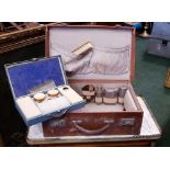 TWO CASED DRESSING SETS, (i) A leather suit case style dressing box, includes glass and silver