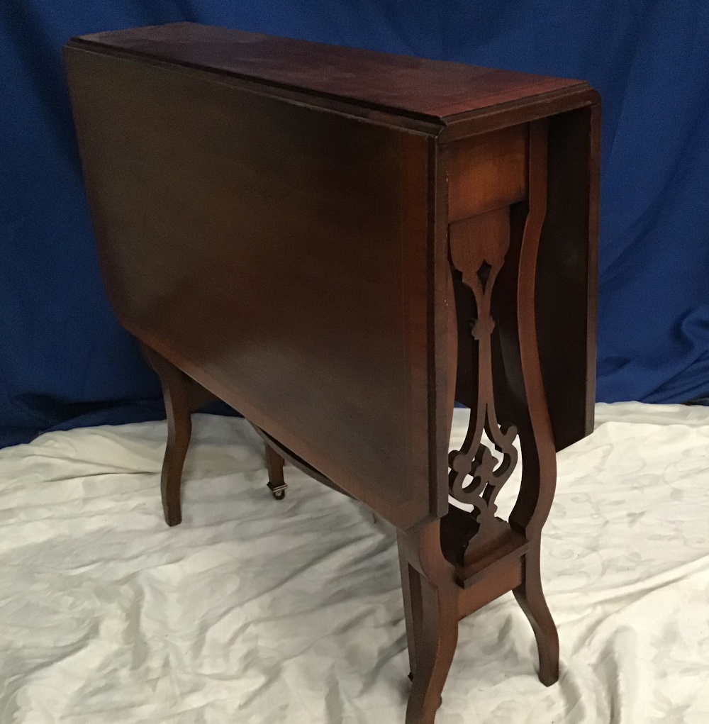 A FINE MAHOGANY DROP-LEAF SUTERLAND TABLE with canted corners to the top, and satinwood cross- - Image 2 of 2