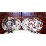 TWO IMARI PLATES, both with floral imagery to the base, one with dark blue floral and pagoda