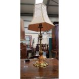 A BRASS TABLE LAMP with shade, 24" tall with shade