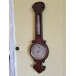 A MAHOGANY BAROMETER BY "RIDDELLS OF BELFAST”, 36” high approx