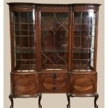 A LARGE SIZED MAHOGANY "CHIPPENDALE" STYLE GLAZED CABINET, with bentwood glazed centre door