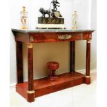 A FRENCH EMPIRE FLAME MAHOGANY ORMOLU MOUNTED MARBLE TOPPED CONSOLE TABLE, with oak lined drawer,