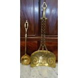 TWO HEAVY BRASS DECORATIVE LADLES, (i) large pierced spoon / ladle with bird motif, (ii) a ladle (