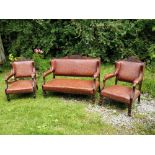 AN EDWARDIAN FRUIT WOOD THREE PIECE DRAWING ROOM SUITE, circa 1900, with faux leather upholstery (