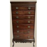 A VERY FINE IRISH STYLE REGENCY TALL BOY CHEST, with blind fret work decoration to the top, and 7