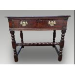 A WILLIAM & MARY OAK SIDE TABLE, circa 1690, with rectangular top, having a moulded edge, a single