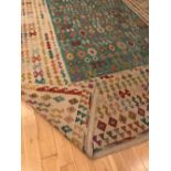 A FINE CAUCASIAN KELIM CARPET, using vegetable dyes, exquisite design, turquoise centre, large ivory