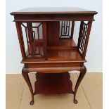 A GOOD QUALITY EDWARDIAN INLAID MAHOGANY REVOLVING BOOKCASE, with pierced lattice type sides/