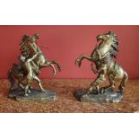 A PAIR OF BRONZE MARLEY HORSES, circa 1880, 16” tall approx