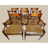 A GOOD QUALITY SET OF 6 & 2 CARVERS MAHOGANY SHERIDAN STYLE CHAIRS, stuffed over good leather seats,