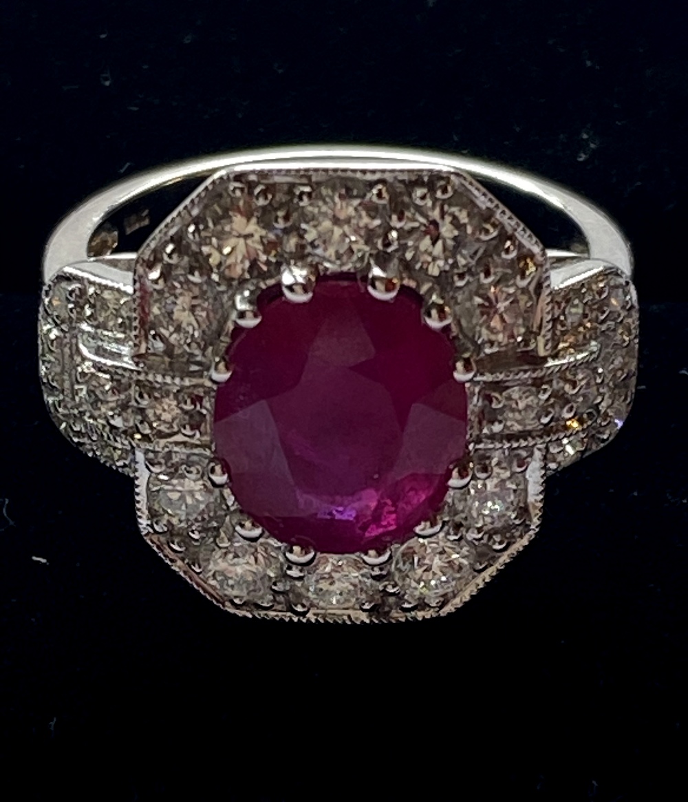 AN 18 CT WHITE GOLD BURMESE RUBY & DIAMOND CLUSTER RING, this is the finest quality Burmese Ruby