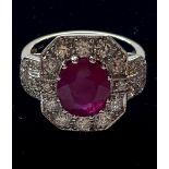 AN 18 CT WHITE GOLD BURMESE RUBY & DIAMOND CLUSTER RING, this is the finest quality Burmese Ruby