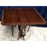 A FINE MAHOGANY DROP-LEAF SUTERLAND TABLE with canted corners to the top, and satinwood cross-