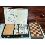 A CASED 'DRAGON TRADEMARK' MAJONG SET, cased, with instructions, along with a chess set