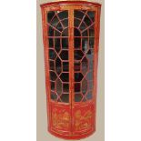 A RARE GEORGIAN "CHINOISERIE" ASTRAGAL GLAZED CORNER CABINET, with two curved glazed doors over