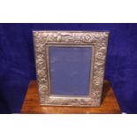 A SILVER PICTURE FRAME, maker's mark NLS for Neil Lasher Silverware Ltd, date letter for 1995, 13" x