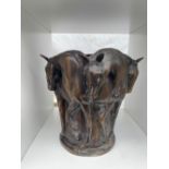 A BRONZE VASE in the form of 5 horses intertwined, unsigned, 29cm tall approx