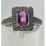 18CT WHITE GOLD PINK SAPPHIRE AND DIAMOND CLUSTER RING this is quite a rare stone of good quality in