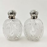 A PAIR OF VICTORIAN SILVER & CUT GLASS SCENT BOTTLES, date 1898, Sheffield, by James Dixon & Sons,