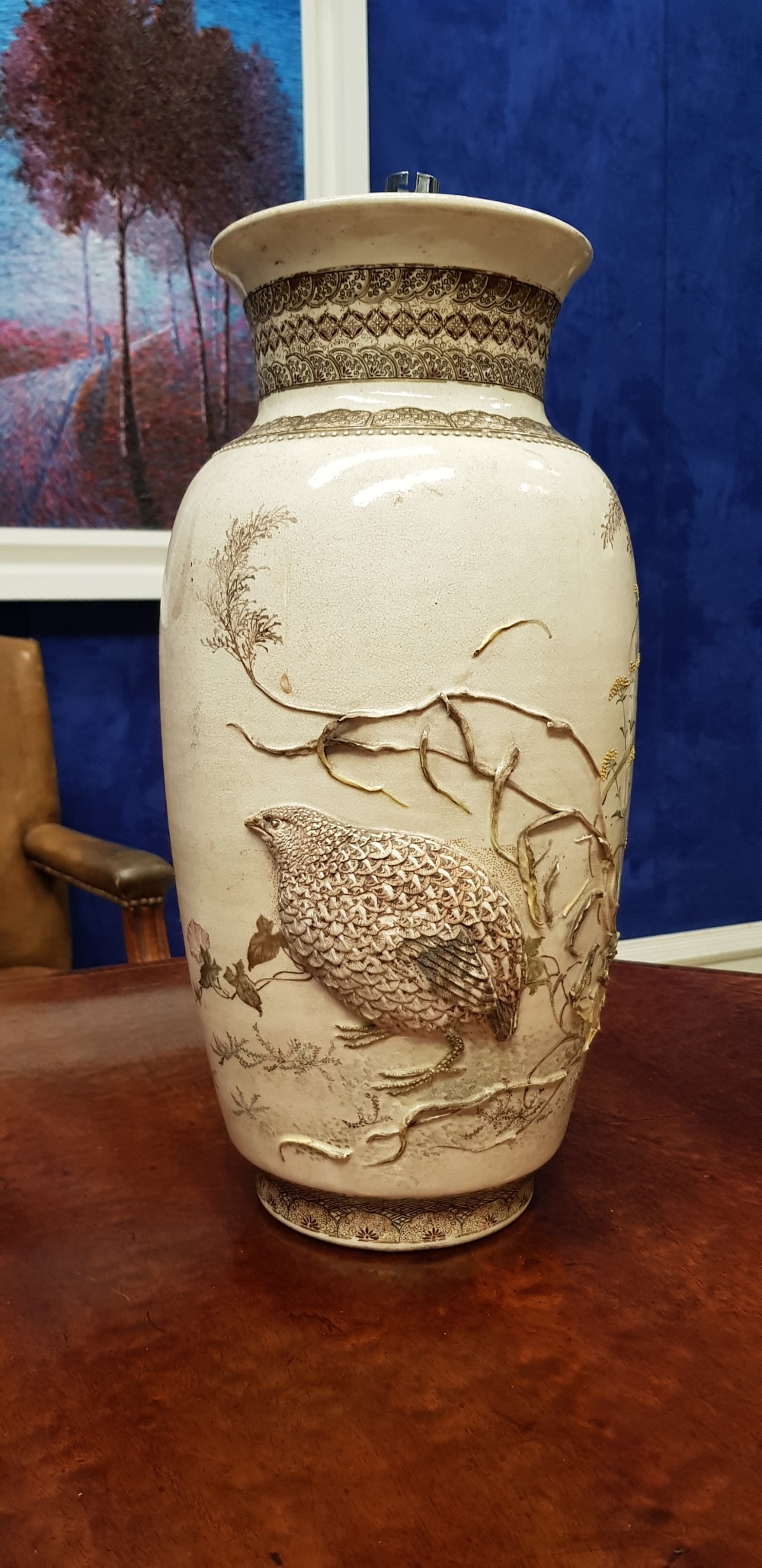 A CHINESE RAISED RELIEF WORK VASE, with images of birds and butterflies, a calligraphic