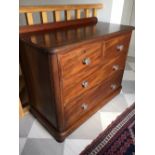 A GOOD QUALITY MAHOGANY CHEST OF DRAWERS, 2 over 2 drawers, with a raised back gallery, glass pull