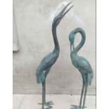 A PAIR OF FINE QUALITY BRONZE HERON GARDEN SCULPTURES, 42in high, 54in high