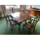 A QUEEN ANNE STYLE MID 20TH CENTURY MAHOGANY DINING ROOM TABLE, with one extra leaf, 41in x 58in,