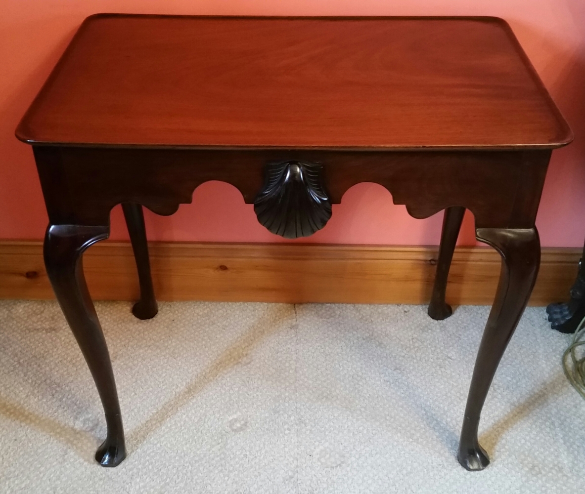 AN 18TH CENTURY IRISH GEORGE III SILVER TABLE, with rectangular dished top, over a double sided