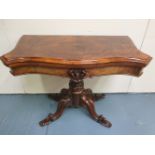 A VERY FINE BURR WALNUT 19TH CENTURY FOLD OVER CARD TABLE, with shaped top, raised on a carved