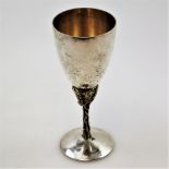 A STUART DEVLIN SILVER GOBLET, with grape vine pattern, London, 1978, 17.2cm high and diameter of