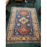 A VERY FINE QUALITY PERSIAN QASQAI FLOOR RUG, with multi borders, central blue ground, having triple