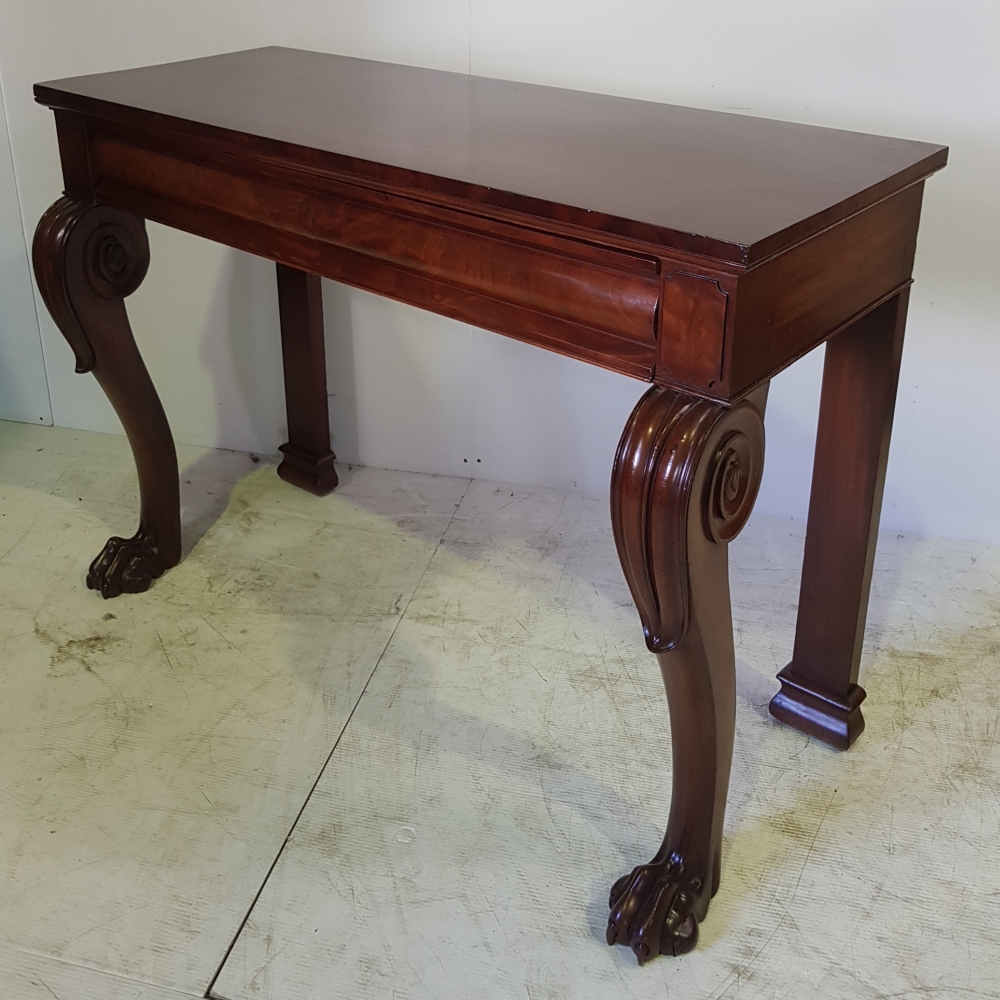 A GOOD QUALITY 19TH CENTURY IRISH PAW FOOT CONSOLE TABLE, with long single drawer and raised on - Image 2 of 4