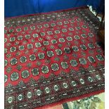 A GOOD BOKHARA FLOOR RUG, 188cm x 262cm approx