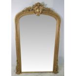 A GOOD QUALITY 19TH CENTURY GILT OVERMANTLE MIRROR, with gadrooned motif to the frame and topped