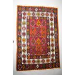 A 20TH CENTURY KELIM RUG, in good condition, 72in x 46in