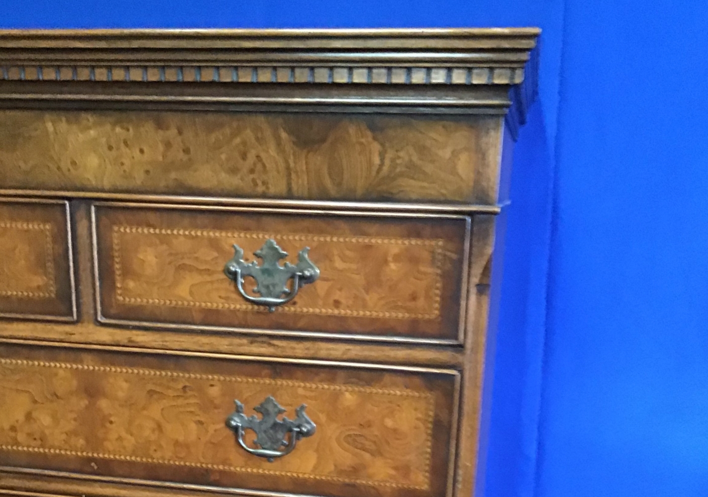 A GOOD QUALITY WALNUT CROSSBANDED CHEST ON CHEST, with brush slide, oak linings, raised on shaped - Image 3 of 3