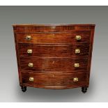 A VERY FINE REGENCY MAHOGANY BOW-FRONTED CHEST, with reeded rim over four graduated drawers each