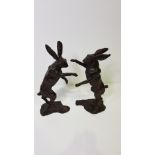 A GOOD QUALITY PAIR OF 20TH CENTURY BRONZE BOXING HARE ORNAMENTS, with foundry mark to base