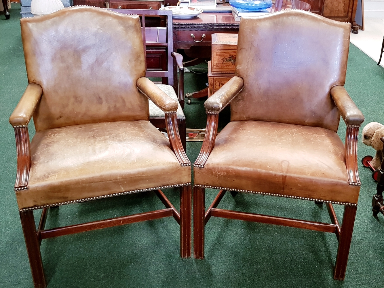 A PAIR OF GOOD QUALITY "GAINSBOROUGH" ARMCHAIRS, 20th century, with solid mahogany frame and leather